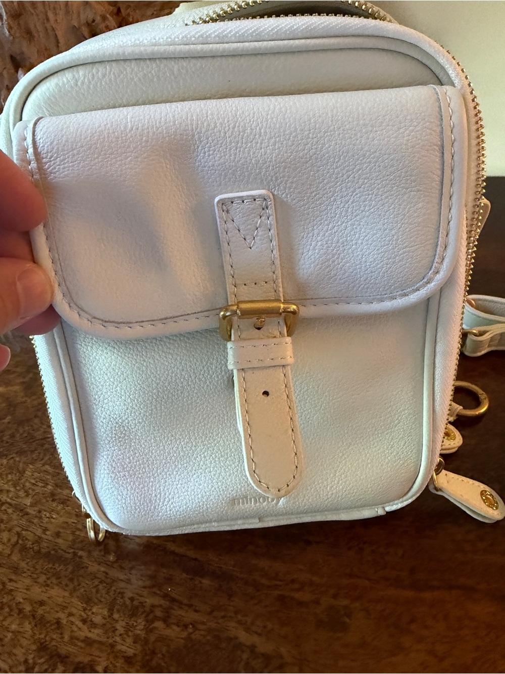 Minooy Naya Small White Crossbody Bag with Gold Buckle Accent